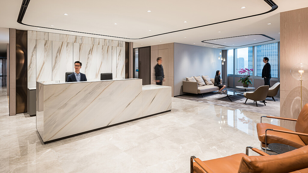 A room with a bed and people in it.