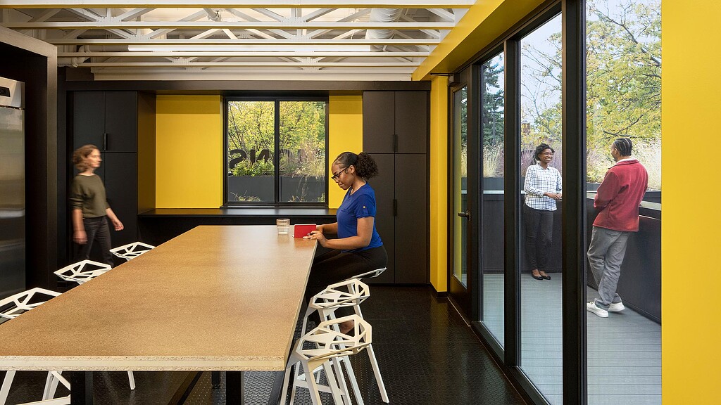 A group of people in a room.