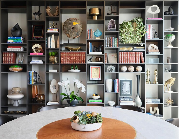 A room with shelves and a table.