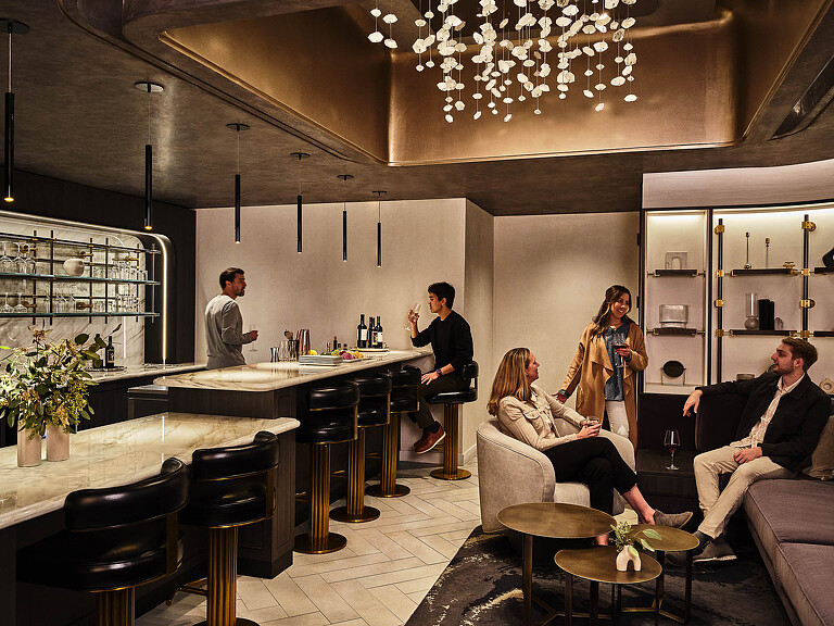 A group of people sitting in a room.