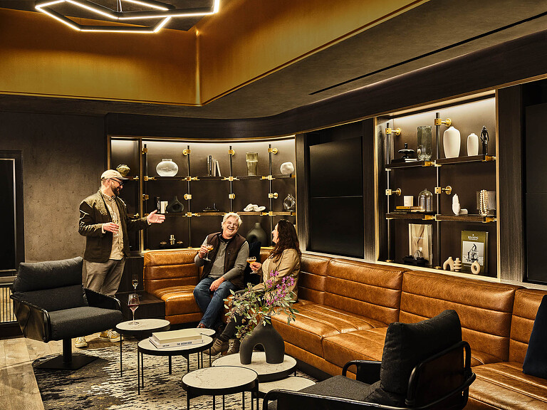 A group of people in a room.