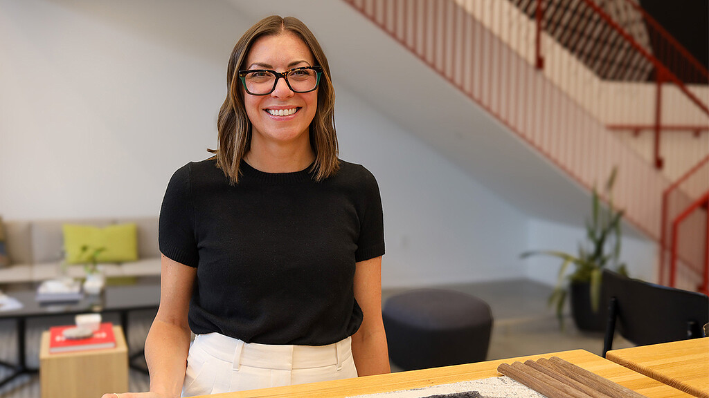 A woman wearing glasses.