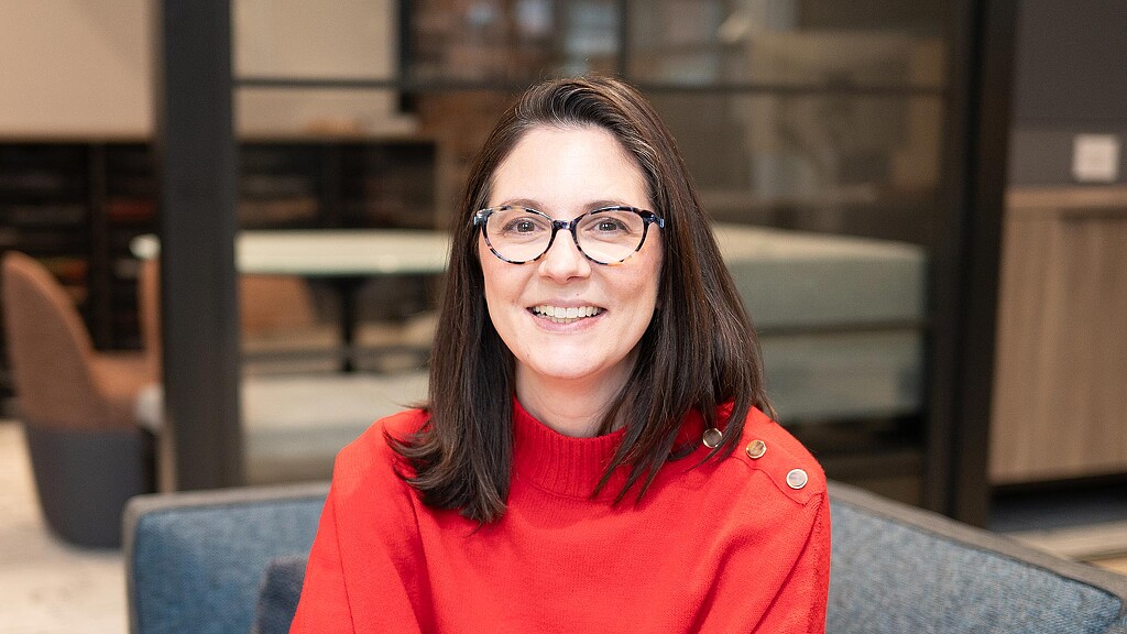 A person wearing glasses.