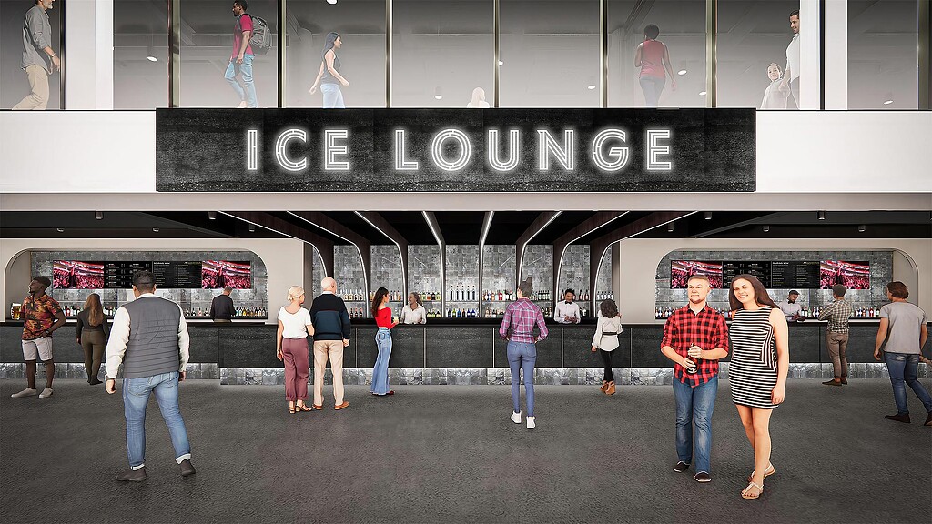 A group of people walking outside a building.