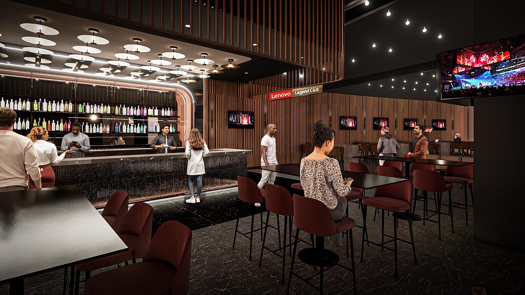 A group of people sitting at a table in a restaurant.