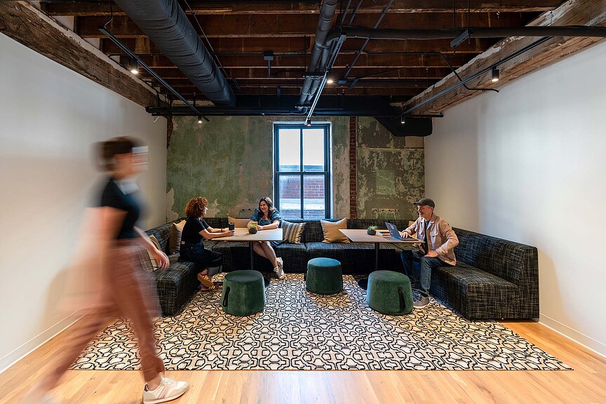 A group of people sitting in a room.