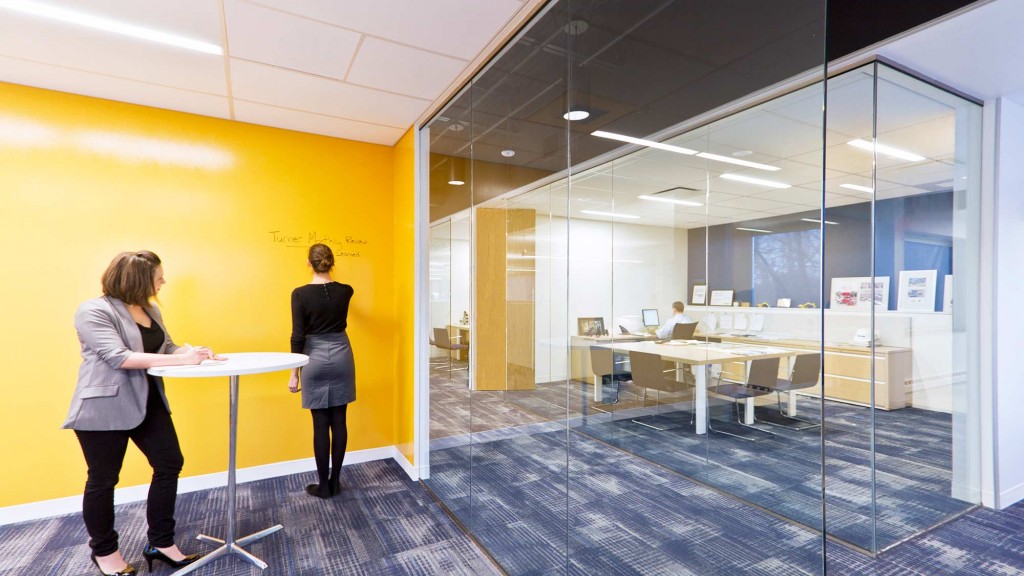 A couple of women in an office.
