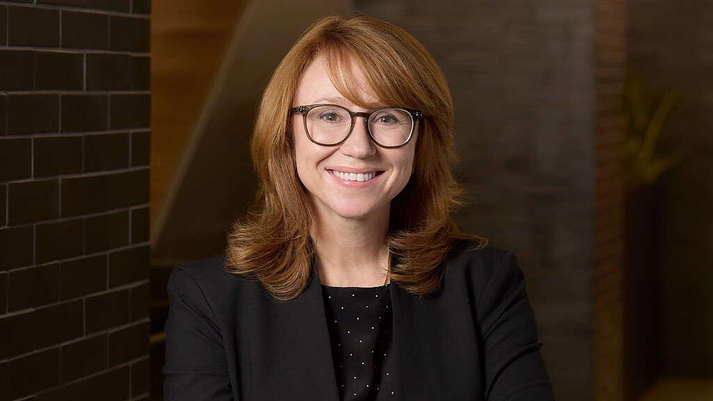 A person smiling for the camera.