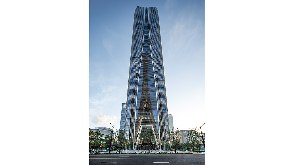 A tall building with a tower.