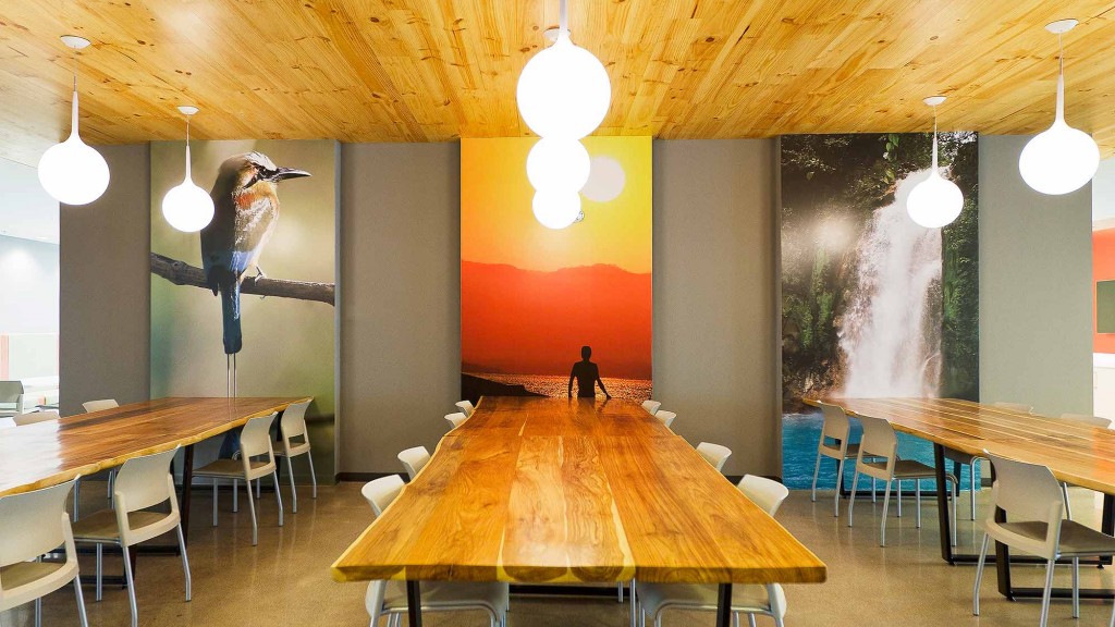 A room with tables and chairs.