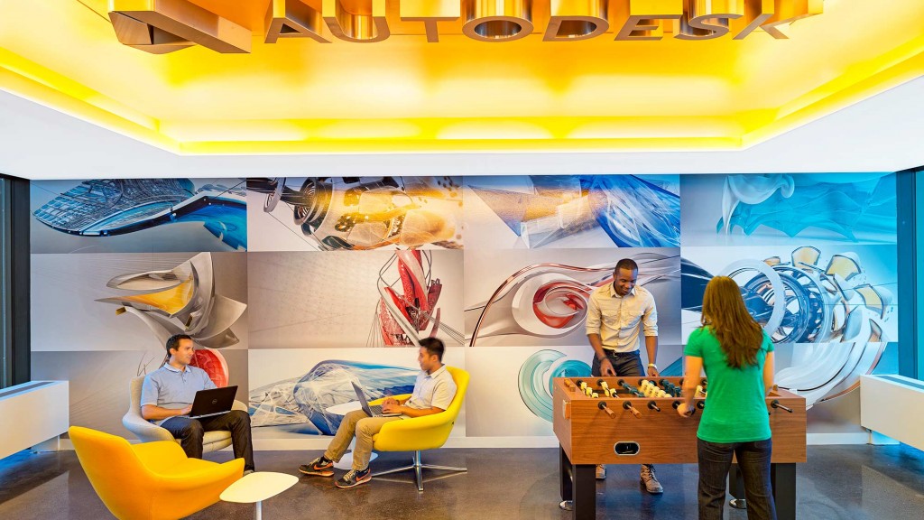 People in a room with art.