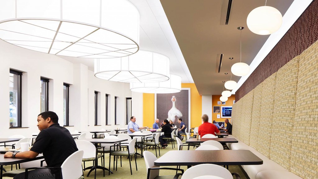 A group of people sitting at tables.