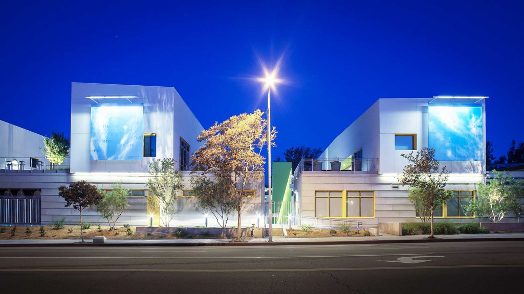 A building with a large screen on the side.