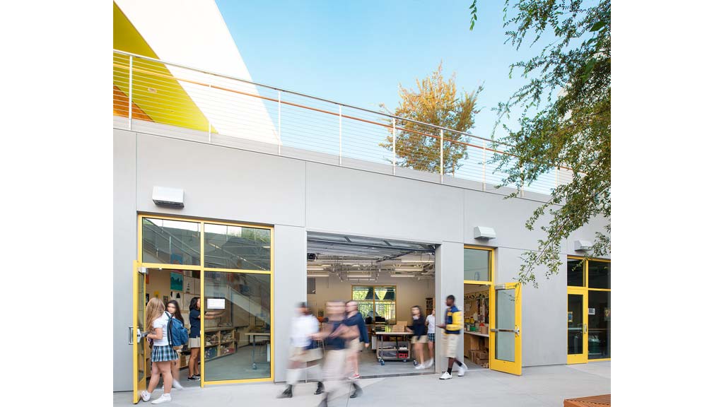 A group of people outside a building.