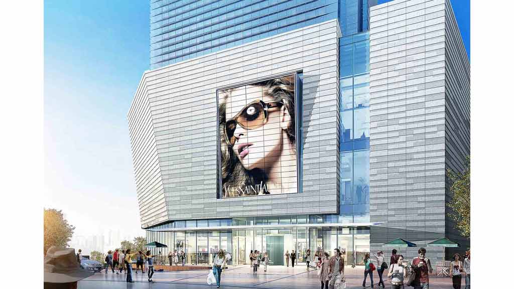 A large building with a large glass window.