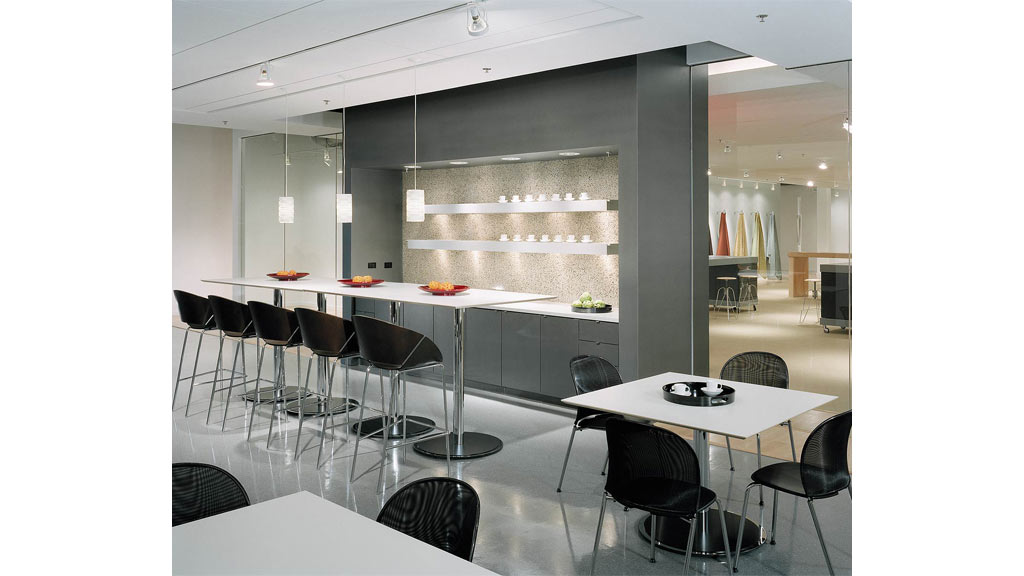 A room with tables and chairs.