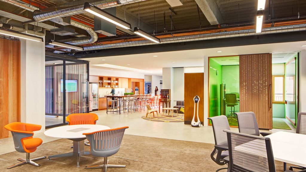 A room with tables and chairs.