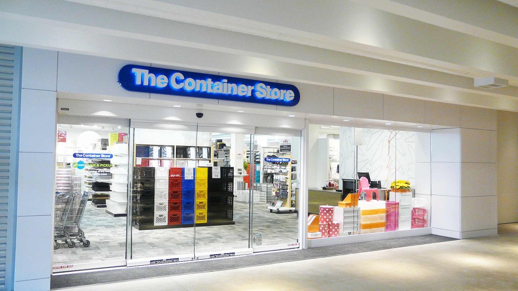 A store front with a blue sign.