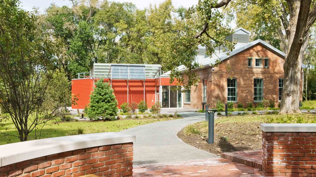 A brick building with a brick walkway.
