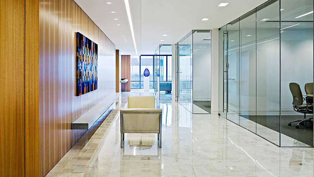 A room with glass walls and a white floor.