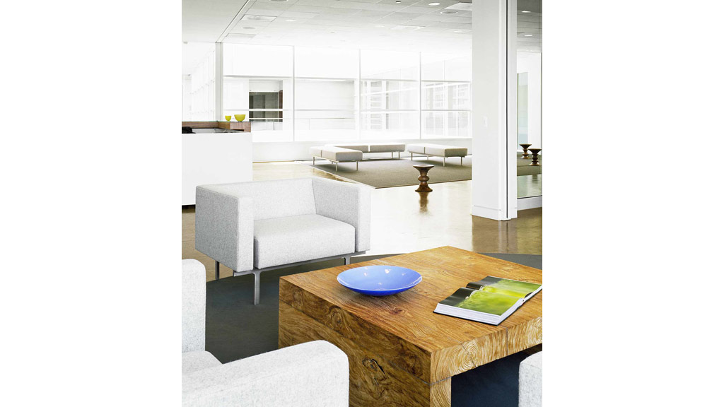 A room with a table and chairs.