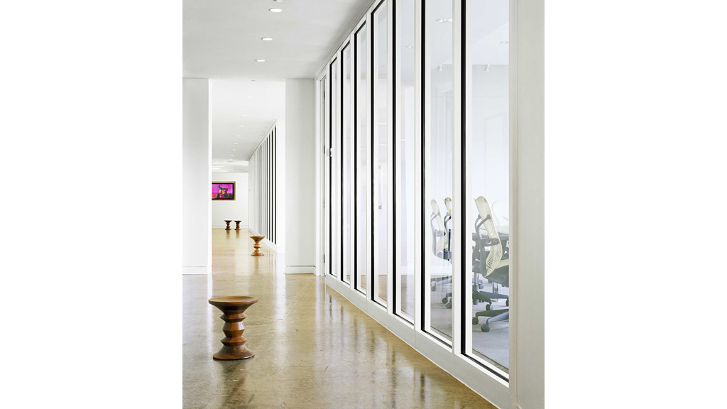 A room with a large glass door.