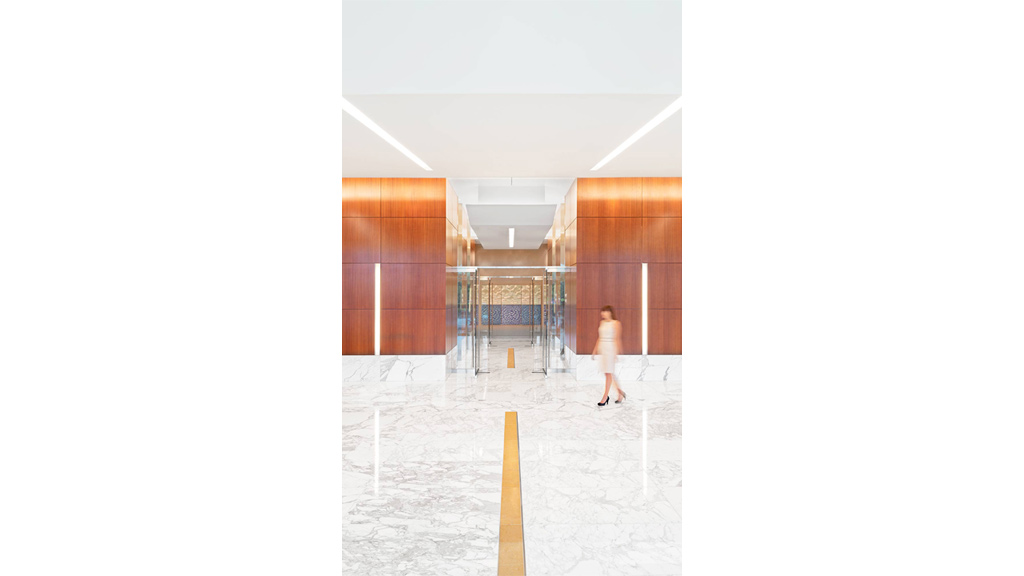 A person walking in a large room.