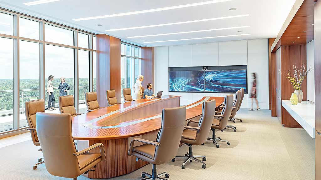 A room with a table and chairs.