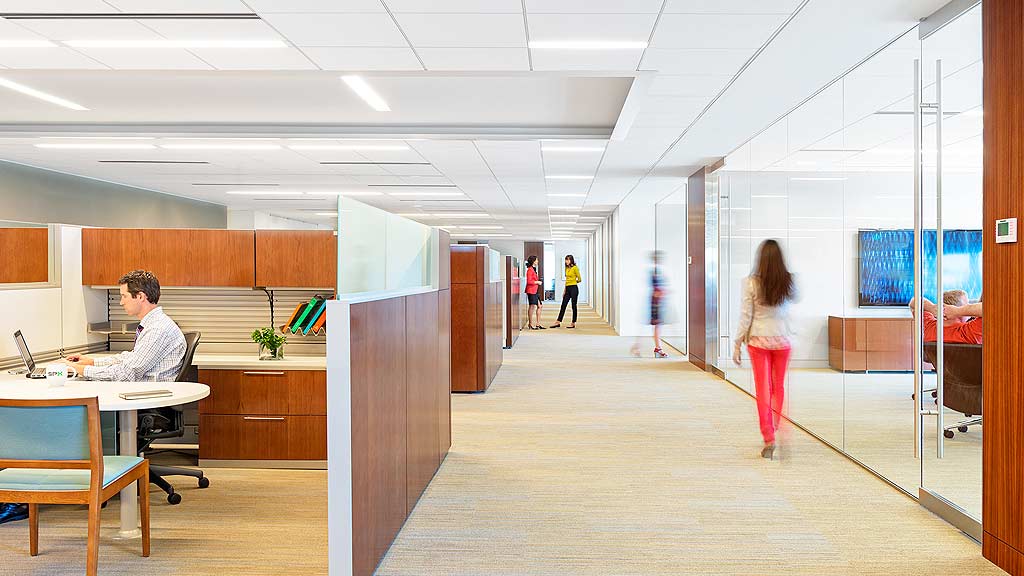 A man and a woman in an office.