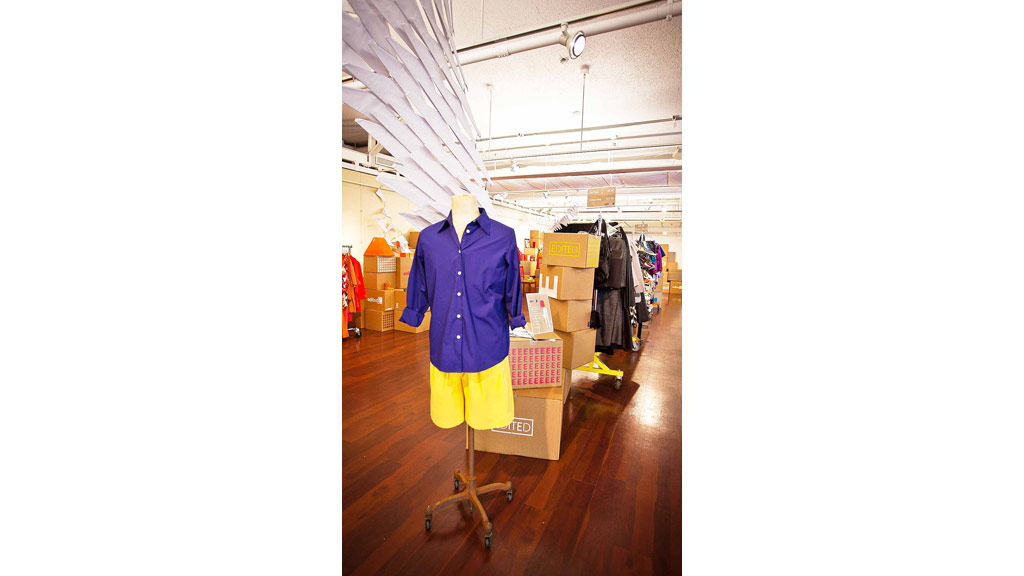 A person in a blue coat.