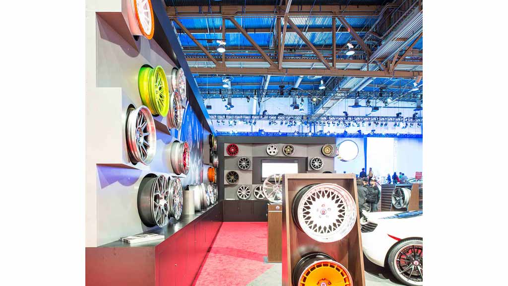 A room with a wall of tires.