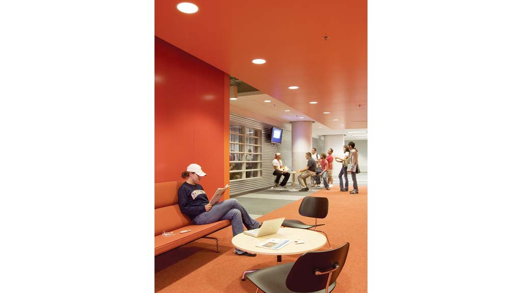 A person sitting on a couch.