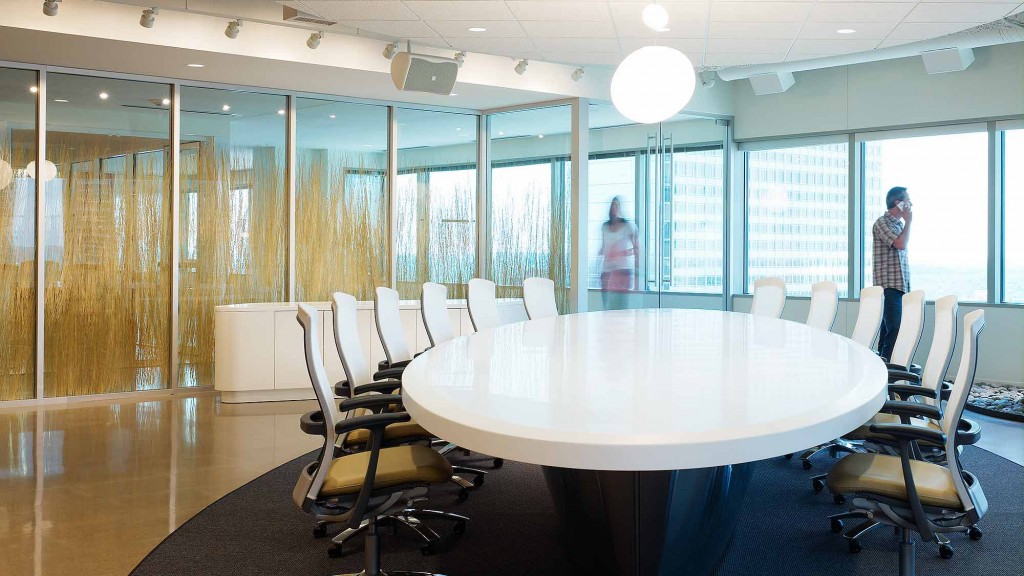 A room with a table and chairs.