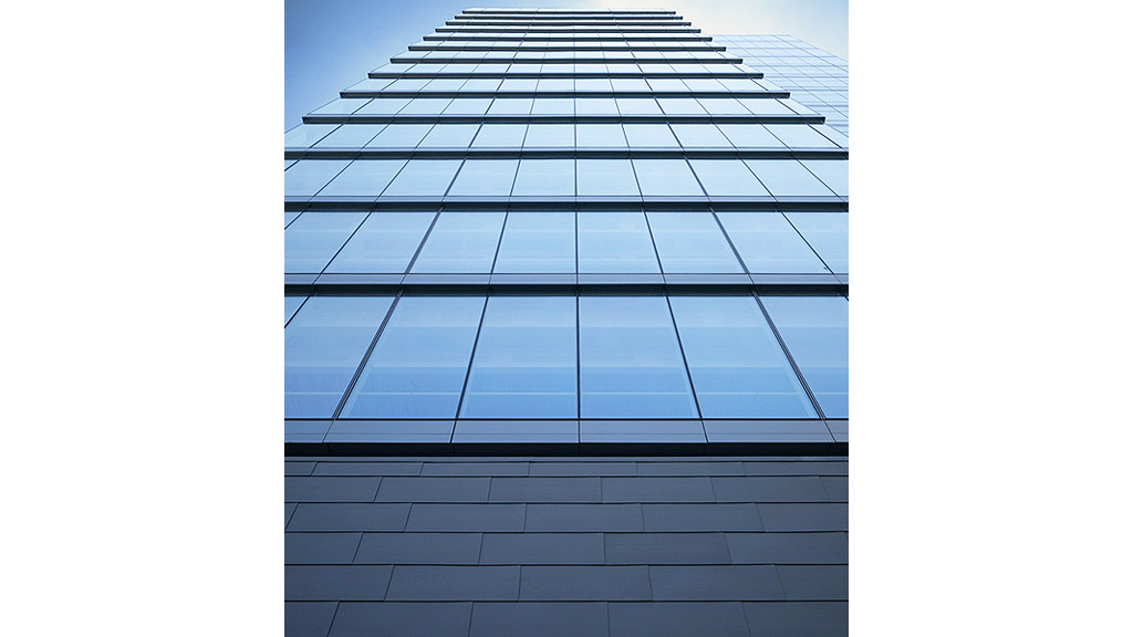 A building with a glass window.