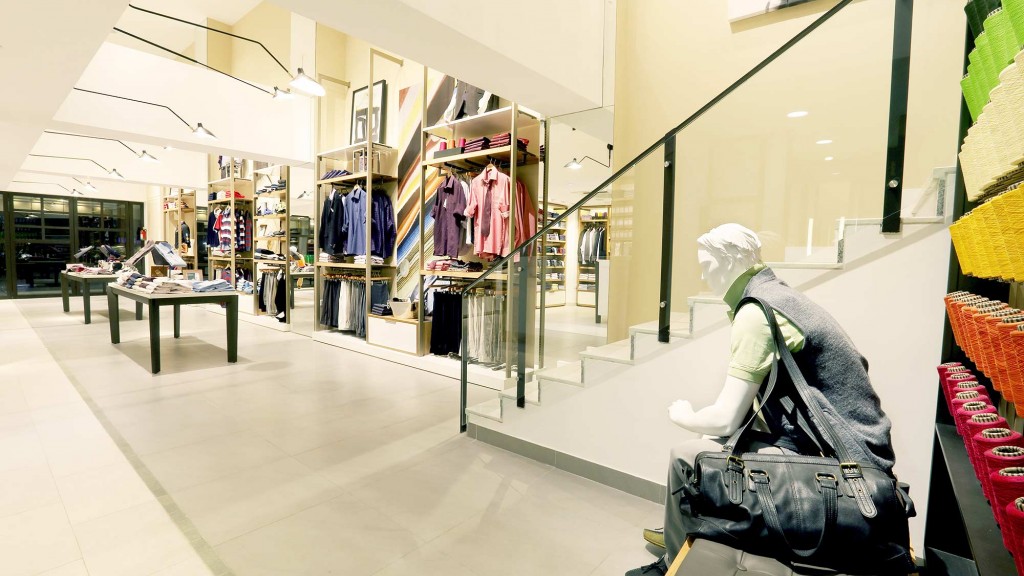 A person sitting in a shopping mall.