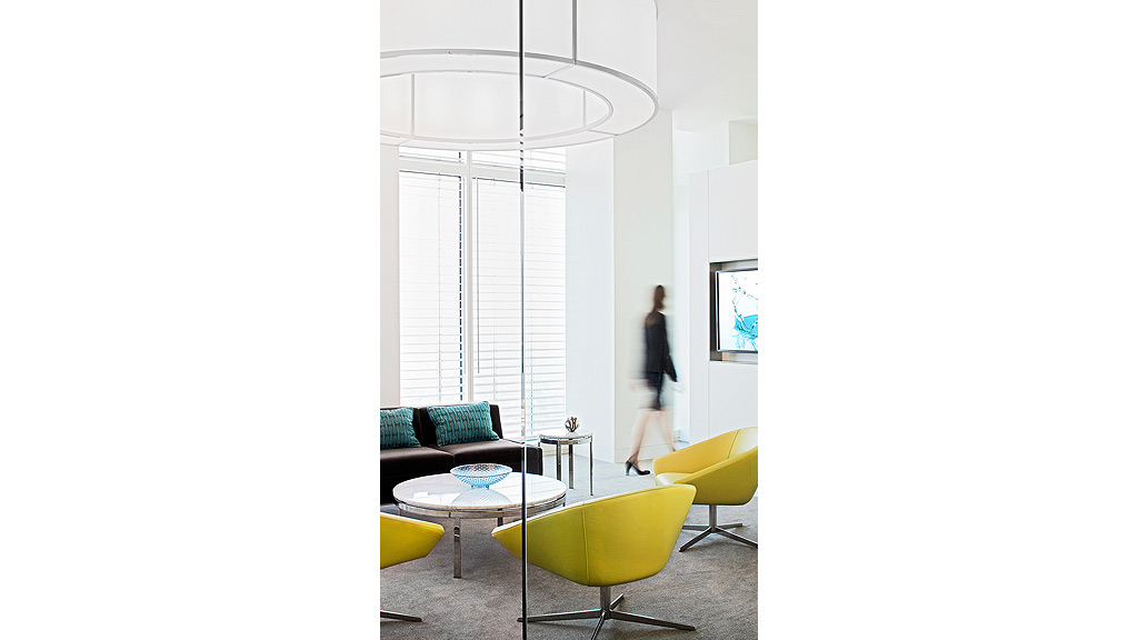 A person walking in a room.