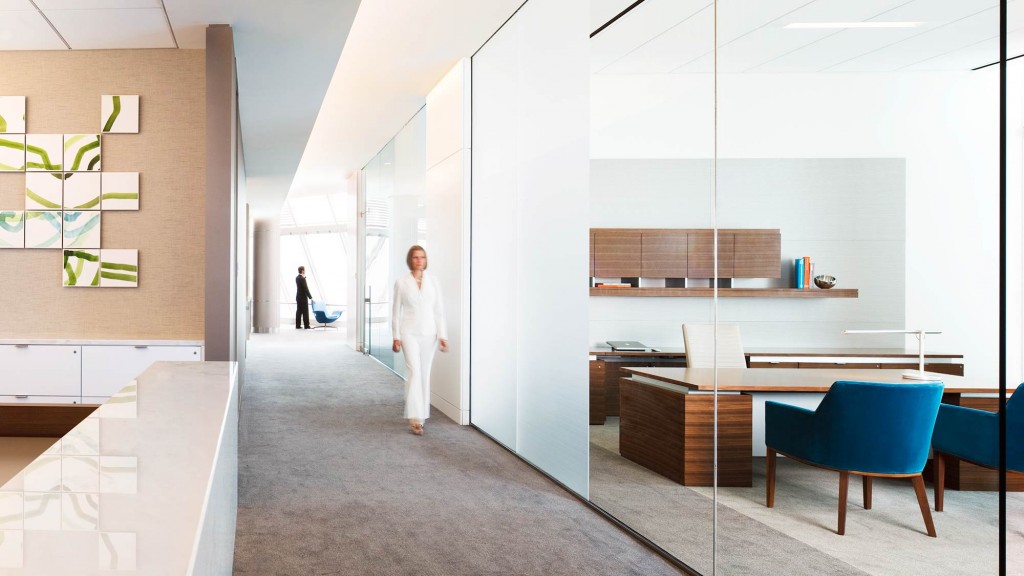 A person walking in a room.