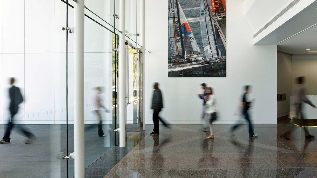 People walking in a hallway.