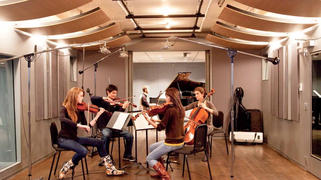 A group of people playing instruments.