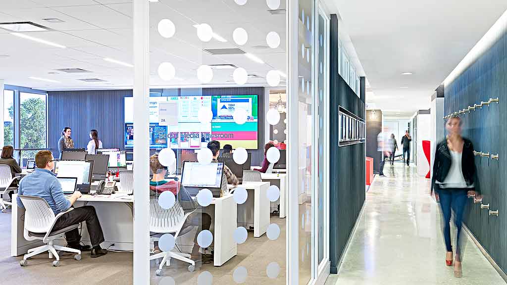 A group of people in an office.