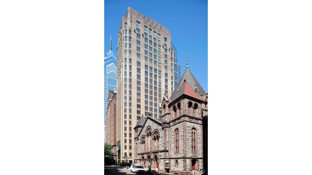 A large building with a tower.