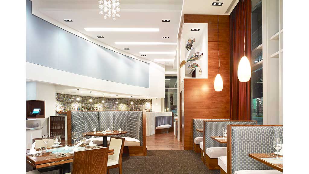 A room with tables and chairs.