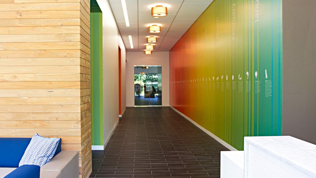 A long hallway with blue and green walls.