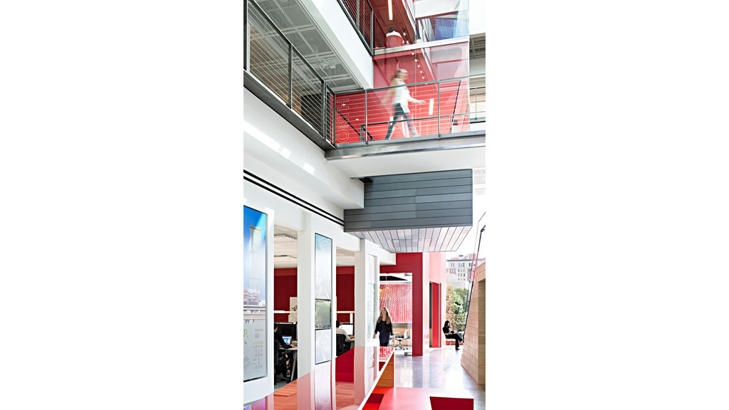 A building with a red railing.