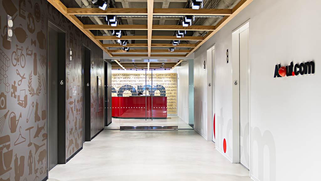 A hallway with white walls.