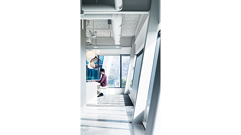 A person sitting at a desk.
