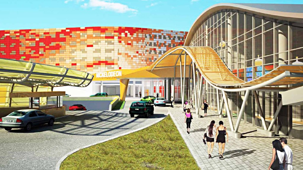 A group of people walking outside of a building.