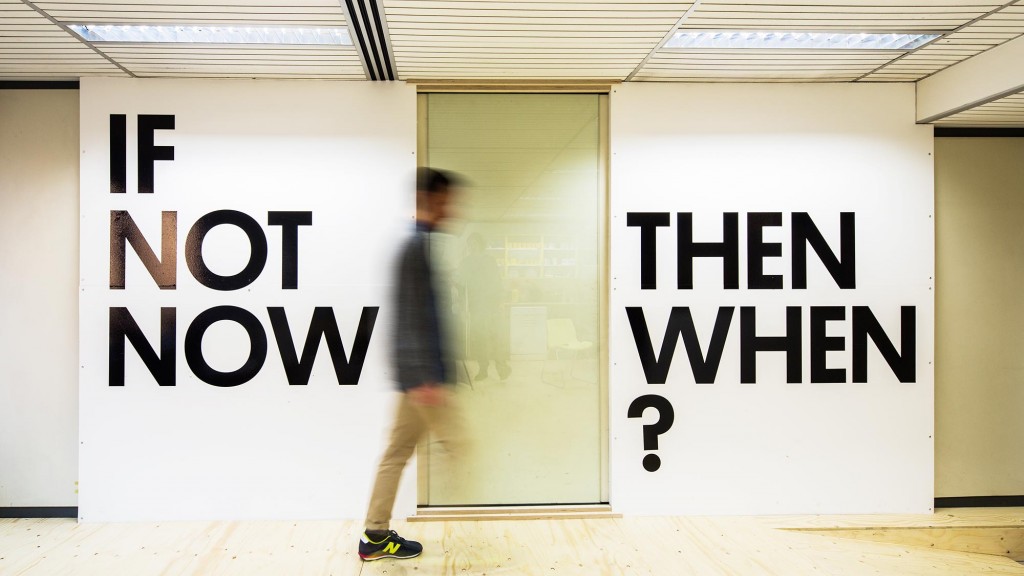 A person walking in a room.