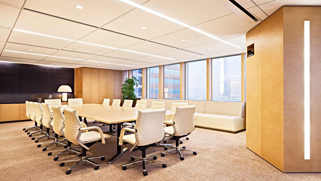 A room with a table and chairs.