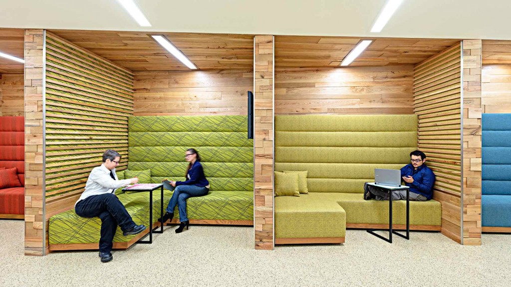 A few people sitting in a room.